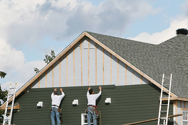 Professional Siding technician working in Mitchells, VA